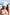 Woman wearing a beige cap with 'dk' logo on a beach