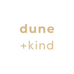 Text 'dune + kind' on a black background